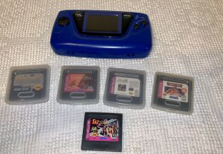 Vintage Blue Sega Game Gear With 5 Games Needs Capps Replaced Dim Screen.