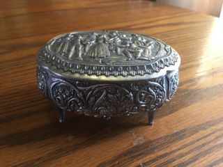 Vtg metal trinket box silver tone repousse decorated footed 3
