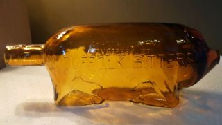 Vintage Suffolk Bitters Pig Bottle “americas Life Preserver” Amber