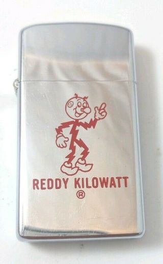 Vintage 1972 Zippo Slim Lighter With Reddy Kilowatt Advertisement