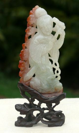 A Chinese Carved Jadeite Figure Of Guanyin With Wood Stand,  19th/20th Century