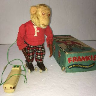 Vintage Frankie The Roller Skating Monkey Toy