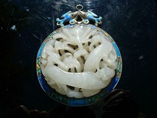A Well Carved Antique Chinese White Jade And Enamel Silver Pendant