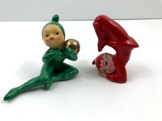 2 Ceramic Pixie Elf Elves Red Hand Stand Green Ball Figurine Christmas Vintage