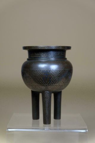A Chinese Bronze Tripod Censer.
