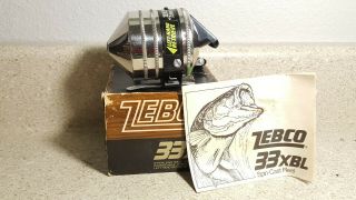 Vintage ZEBCO 33XBL SPINCAST REEL WITH BOX AND PAPERS 