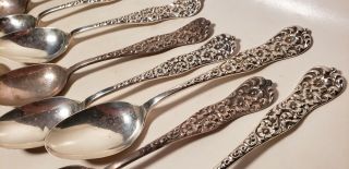 12 ANTIQUE STERLING SILVER SPOONS - DOMINICK &HAFF - 9.  9 OZT - 6 IN - FLOWER REPOUSE 2