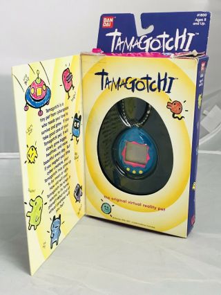 Vintage Tamagotchi Blue 1997 Virtual Pet Keychain 1800 Bandai Package