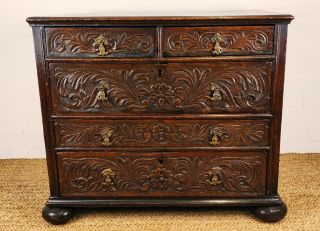 A 17th Century Carved Chest Of Drawers