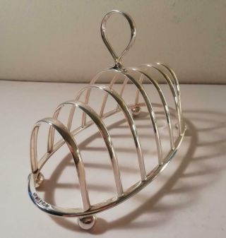 An Antique Georgian Style Six Division Silver Toast Rack : Sheffield 1909