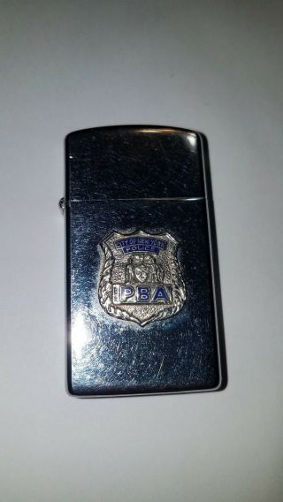 1962 Slim Zippo P.  B.  A.  York Police Badge Lighter Police Benevolent Assoc.