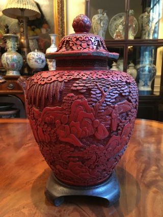 A Large and Rare Chinese Qing Dynasty Cinnabar Covered Vase with Wooden Stand. 3