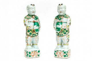 A Pair Chinese Qing Dynasty Rose Mandarin Porcelain Figures Depicting Two Boys.