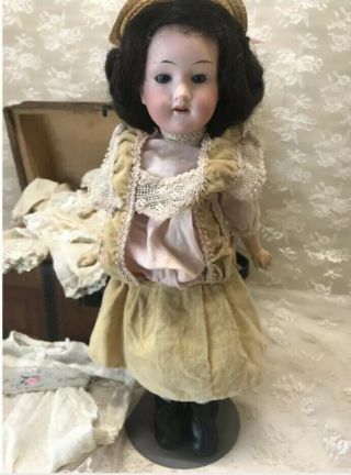 Antique German Bisque doll W/Trunk & Troisseau 3