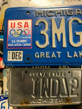 Michigan Great Lakes US Olympic Education Center License Plate Tab 97 3MG82. 2