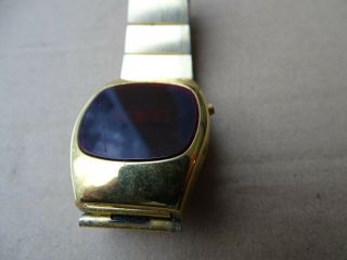 GOLD COLORED LED WATCH VINTAGE 1970 ' S WITH RED GLASS SWISS CASE LOOK 2