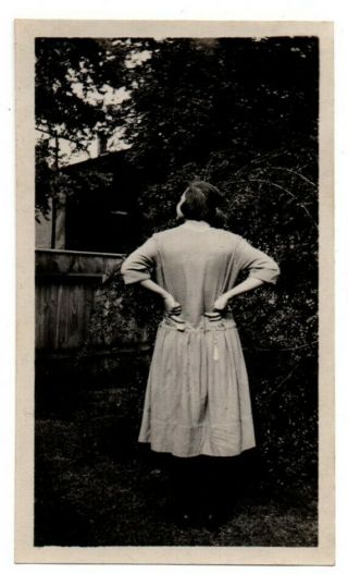 Nicely Dressed Woman Back To Camera Unusual Fun Pose Vintage Snapshot Photo