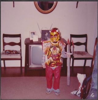 A76 - Kid In Front Of Tv In Devil Costume Halloween - Old/vintage Photo Snapshot