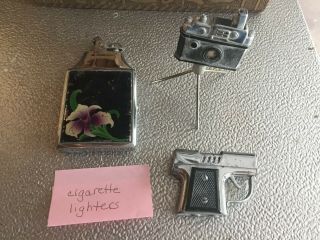 3 Vintage Cigarette Lighters And One Is A Cigarette Lighter With Case