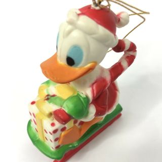 Vintage Walt Disney Donald Duck Christmas Ornament Plastic Figurine Sledding