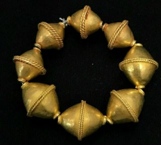 A rare pyu gold BEADS of 18 karat originating from Burma 2