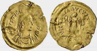Gold Tremissis Of Emperor Justinian I (527 - 565),  Constantinopolis.  A Coin