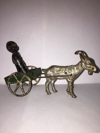 Rare Antique Toy Of A Black Boy Riding In A Goat Cart.