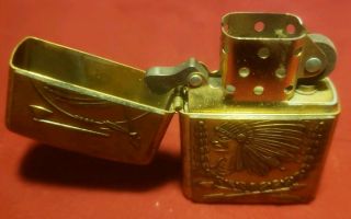 VINTAGE ZIPPO LIGHTER INDIAN CHIEF HEAD WITH ARROWS & HATCHET U.  S.  A.  AS PICTURED 3