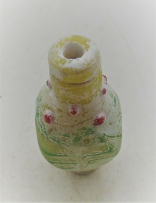 ANCIENT PHOENICIAN GLASS BOTTLE WITH FLORAL MOTIFS 2