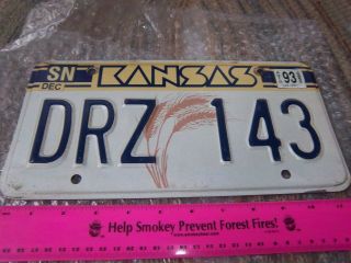 Kansas Metal License Plate,  1989 Issue,  Wheat Logo,  Drz 143,  1993 Tag