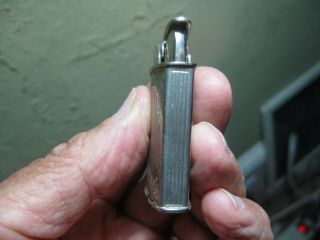 Vintage EVANS Pocket Lighter No.  19023 US Pat.  RE Exp.  June 12,  1952 IT SPARKS 2
