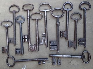 12 huge mostly 18th century French wrought iron keys 3