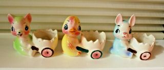 3 Adorable Vintage Egg Cups Eggcups Chick Rabbit Kitten With Carts