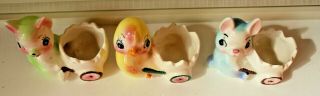 3 adorable Vintage Egg cups eggcups Chick Rabbit Kitten with carts 2