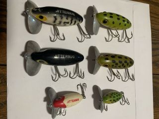 9 Vintage Fred Arbogast Lures,  6 Jitterbugs,  3 Hula Poppers