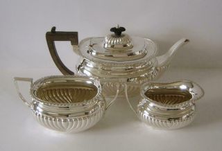 An Antique Sterling Silver Three Piece Tea Set Birmingham 1911 1197 Grams