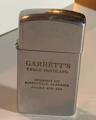 Vintage 1975 Slim Zippo Lighter ”garrett’s Truck Parts” Advertising