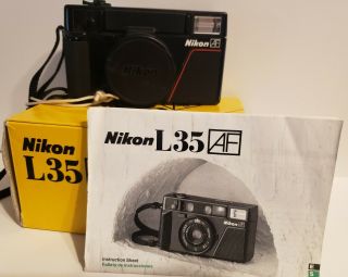 Vintage Nikon L35af 35mm Point And Shoot Film Camera W/ Box.  &.