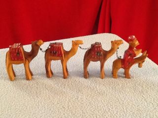 Vintage Hand Carved Wooden Camel Team Figurines 3 Camels With Leader On A Donkey