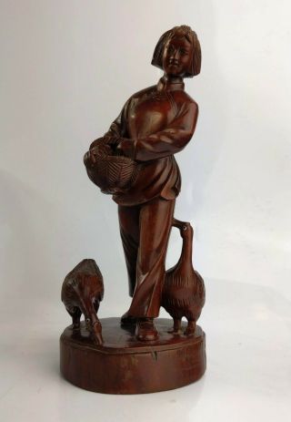 Chinese Cultural Revolution Carved Hard Wood Figure Of A Woman Feeding Geese