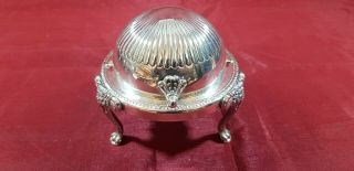 A Vintage Silver Plated Roll Top Butter Dish With Lions Heads.  Very Ornate.