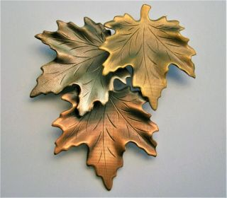 J599:) Vintage Mixed Metal Copper Gold Silver Tone Maple Leaf Canada Brooch