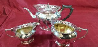 An Antique Silver Plated Tea Set With Elegant Pierced Patterns.  Cooper Brothers.