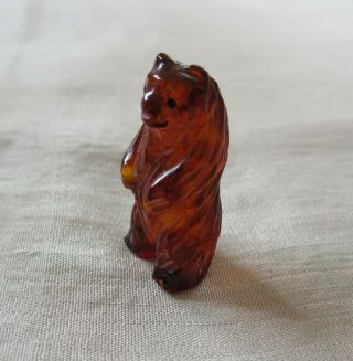 Small Vintage Zuni Standing Bear Fetish Of Carved Amber,  " Re " Signed On Foot