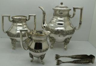 Chinese Export Silver 4 PIECE TEA SERVICE.  FIERCE DRAGON FEET,  FLORAL c.  1900 2