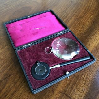 An Antique Opticians Lens,  Late 19th / Early 20th Century.  In Leather Case.