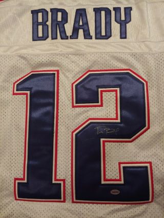 Tom Brady Signed White Reebok Jersey,  " All About The Game Authentics "