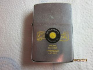 " Delta Music Co.  " Houma/thibodaux,  La.  Vintage Zippo Lighter
