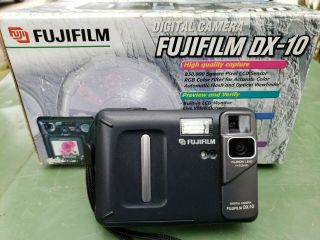 Fujifilm Dx - 10 Digital Camera Black 5.  5mm Digital 1.  6x Smart Media Vintage W/box