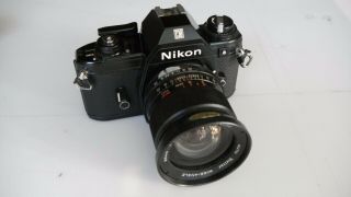 Vintage Nikon Em 35 Mm Camera With Lens